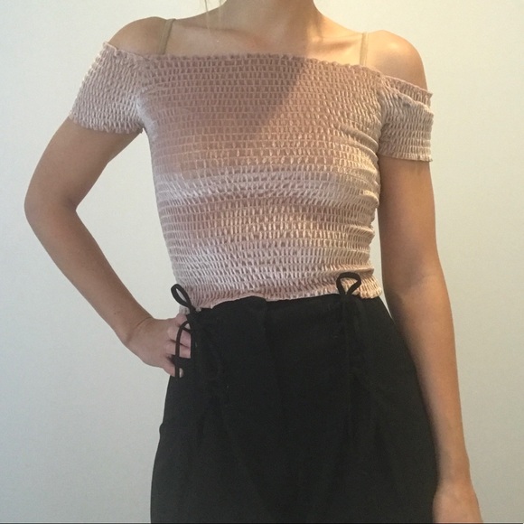 High-waisted pleated pants with lace-up features. - Picture 2 of 3